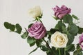 Delicate bouquet of light purple and white roses and eucaliptus Royalty Free Stock Photo