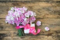 Delicate bouquet of sweet peas and gift box