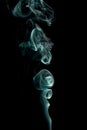 Delicate and bright smoke waves on dark background Royalty Free Stock Photo