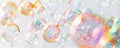Delicate bubbles of various sizes and iridescent colors suspended in mid-air Royalty Free Stock Photo