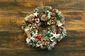 Delicate Christmas wreath of pine cones