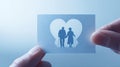 The delicate cutout of an elderly couple in a heart shape holding hands. AI generated image Royalty Free Stock Photo