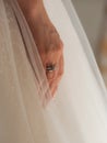 Delicate details of the wedding celebration. Newlyweds hold hands