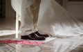 Delicate details of the wedding celebration. Newlyweds hold hands