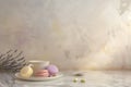 Delicate Display of French Macarons with Tea on a Marble Surface Royalty Free Stock Photo