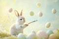 A delicate Easter Bunny creating artistic egg designs with an ethereal paintbrush, as the pastel Royalty Free Stock Photo