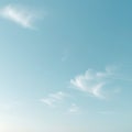 Delicate Feathery Clouds in a Soft Blue Sky image photo Royalty Free Stock Photo