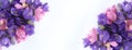 Delicate floral arrangement of pink daisies and lilac bells on a white background.