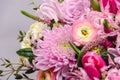 Delicate fresh bouquet of fresh flowers with pink Ranunculus, rose, astra and chrysanthemum. Royalty Free Stock Photo