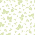 Delicate green leaves create a seamless repeating botanical pattern on white Royalty Free Stock Photo