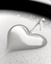 Delicate Heart Shape Emerges From Frothy Milk Foam on a Serene Surface Royalty Free Stock Photo