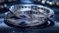 a delicate Indian bangles set adorned with two marquise-cut blue sapphires, elegantly set in 14k white gold, capturing Royalty Free Stock Photo