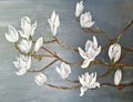 delicate magnolia flowers on a tree branch soft pink white