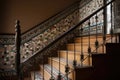 delicate mosaic tile pattern on staircase railing Royalty Free Stock Photo