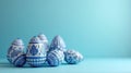 Delicate pastel blue Easter eggs on a soft blue background, perfect for creative projects, seasonal designs, copy space Royalty Free Stock Photo