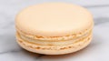 A Delicate Peach Macaron on Marble Royalty Free Stock Photo