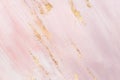 Delicate pink marble background with gold brushstrokes. Place for your design Royalty Free Stock Photo