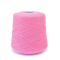 delicate pink yarn for knitting on a bobbin on a white background