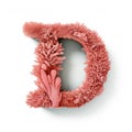 Delicate Precision: Coral Wood Letter D With Pink Seaweed Texture