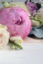 Delicate romantic bouquet for a gift. Huge pink peonies and white roses on a white background. Flower arrangement for Valentine`s Royalty Free Stock Photo