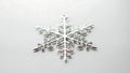 Silver Snowflake Ornament on White Background winter holiday dec Royalty Free Stock Photo