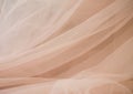 Delicate soft beige fabric abstract background with blur Royalty Free Stock Photo