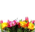 A delicate spring bouquet of yellow roses, pink tulips and Alstroemeria. Royalty Free Stock Photo
