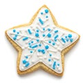Delicate star-shaped cookie decorated with blue icing and sprinkles for the holidays Royalty Free Stock Photo