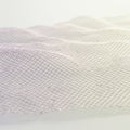 A delicate, undulating grid creates a wavy pattern, resembling a mesh or netting. The Royalty Free Stock Photo