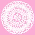 Delicate knitted lace doily isolated on pink background