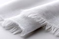 Soft white linen fabric draped elegantly on a smooth surface creating a tranquil and minimalist aesthetic Royalty Free Stock Photo