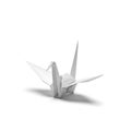 Single white origami crane on a white background Royalty Free Stock Photo