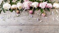 Delicate white pink peony with petals flowers and white ribbon on wooden board. Overhead top view, flat lay. Copy space. Birthday, Royalty Free Stock Photo