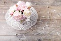 Delicate white pink peony with petals flowers and white ribbon on wooden board. Overhead top view, flat lay. Copy space. Birthday, Royalty Free Stock Photo