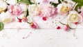 Delicate white pink peony with petals flowers and white ribbon on wooden board. Overhead top view, flat lay. Copy space. Birthday, Royalty Free Stock Photo