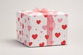 A delicately designed white box with a vibrant pink ribbon and adorable heart patterns, perfect for a thought