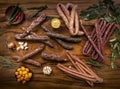 Delicatessen cold cuts german sausage selection on wood table Royalty Free Stock Photo