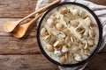 Delicatessen food: clams stewed in cream with garlic and greens Royalty Free Stock Photo