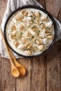 Delicatessen food: clams stewed in cream with garlic and greens Royalty Free Stock Photo