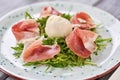 Delicatessen salad with burrata cheese. Royalty Free Stock Photo