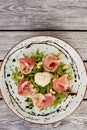 Delicatessen salad with burrata cheese, top view. Royalty Free Stock Photo