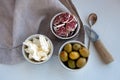 Delicious antipasto catering platter with different meat and cheese products. cheese, olives and ham for a simple breakfast. linen Royalty Free Stock Photo