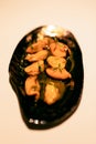 Delicious appetizer, Giant mussels with gourmet sauce. Selective focus