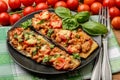 Delicious appetizer -grilled eggplants baked with minced meat, tomatoes and cheese. Royalty Free Stock Photo