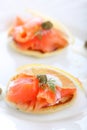 Delicious appetizer with salmon pancake