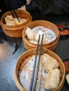Delicious and appetizing dim sum in bamboo steamers