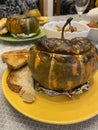 delicious appetizing healthy baked pumpkin with toasted bread on the dinner table beautiful food