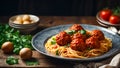 Delicious appetizing meatballs with spaghetti, tomato sauce in the kitchen