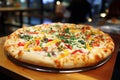 Delicious appetizing pizza close-up in restaurant