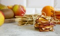 Delicious apple chips. Drying fruits at home. Dietary nutrition.